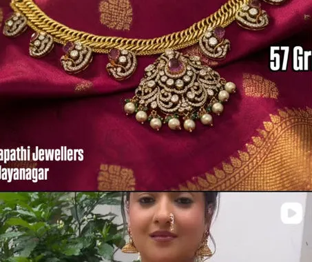 A diamond necklace on maroon silk, captioned 57 grams